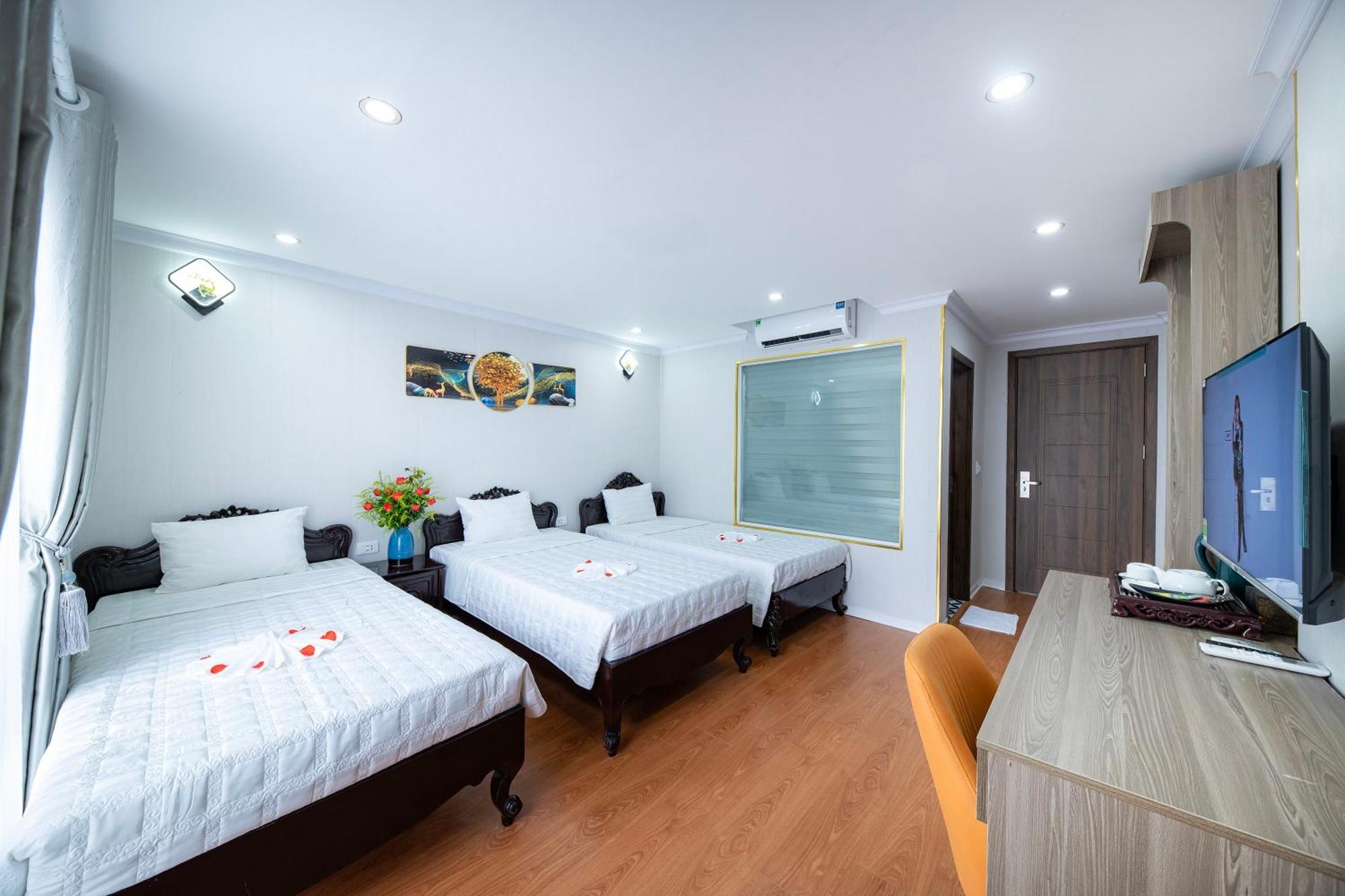 Habitación Triple con vistas a la ciudad